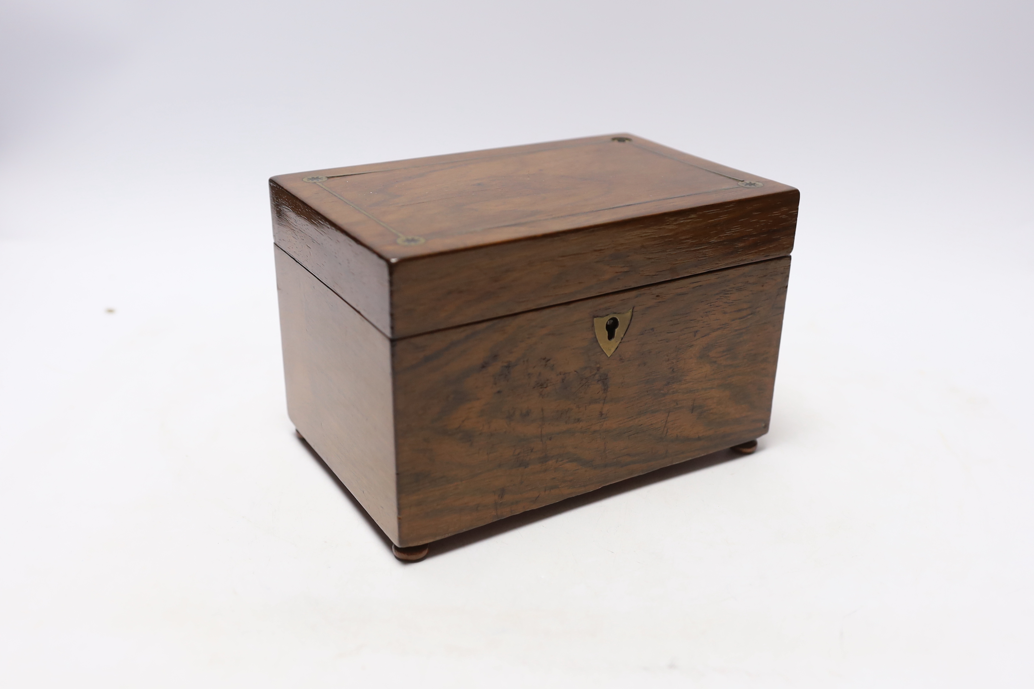 A Victorian burr walnut brass inlaid domed topped tea caddy with domed top interior and a brass inlaid rosewood tea caddy, largest 25cm wide